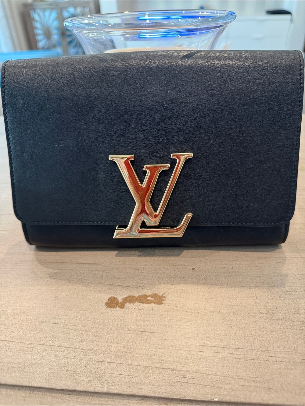 Louis Vuitton Black Leather Mini Bag with Gold LV Emblem